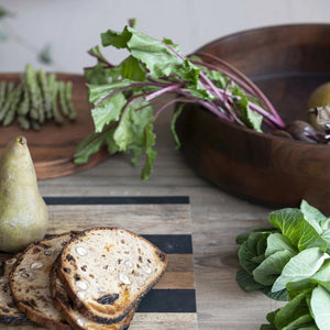 Presenting the ACACIA SERVING BOWL by CREATIVE COOP, a round serving bowl crafted from Acacia Wood with a smooth walnut finish and rich brown hue. This elegantly designed bowl boasts a consistent grain pattern and a slightly tapered base, perfect for any setting. Available for in-store pickup.