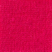 Close-up view of the vibrant textured fabric of the KINROSS CASHMERE - CASHMERE RUANA in a rich magenta color. The 100% cashmere material displays a consistent pattern and a slightly fuzzy surface, highlighting its soft and plush nature.