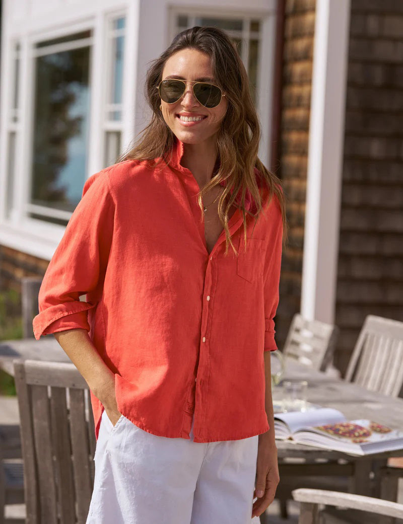 The FRANK &amp; EILEEN EILEEN Relaxed Button Up Shirt in Washed Linen Summer Red features long sleeves, a chest pocket, and rolled-up cuffs, shown against a white background.