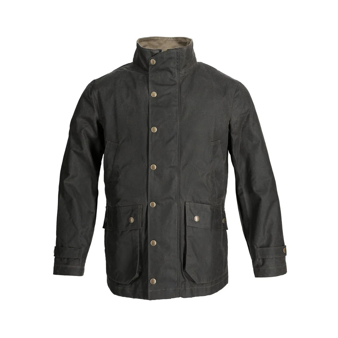 The TOM BECKBE Tenshaw Jacket in Hardwood is a dark green, USA-made waxed canvas jacket with a high collar, snap buttons, two front flap pockets, buttoned cuffs, and durable water-resistant shelter cloth for a rugged look.