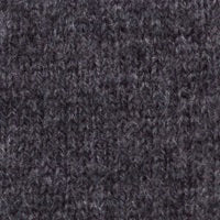 Close-up texture of the KINROSS Rib Knit Cashmere Skirt, showcasing a dark gray fabric with a tight, slightly fuzzy weave pattern characteristic of 100% cashmere. The fibers create a dense, uniform surface ideal for warm clothing or accessories. This 12gg, 2ply material ensures maximum coziness and durability, reflecting the quality synonymous with the KINROSS brand.