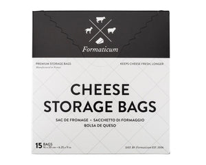 The Formaticum product packaging box for cheese storage bags is perfect for keeping cheese fresh at home. The box has a mainly white design with black accents and text, displaying icons of various cheese shapes. The text reads "FORMATICUM - CHEESE STORAGE BAGS" and indicates that it contains 15 bags.