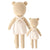 Two beige, hand-knit Goldie the Honey Bears from CUDDLE & KIND, one larger at 20 inches and one smaller, are standing side by side. Both bears are wearing white aprons that cross at the back. Made from safe, non-toxic materials, these fair trade dolls have simple features with no visible faces or distinguishing characteristics.