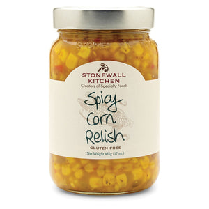 A 17 oz (482 grams) jar of STONEWALL KITCHEN - SPICY CORN RELISH features a Tex-Mex themed label with the product name and "gluten free" description. The jar showcases yellow corn relish with visible corn kernels and spices, topped with a silver lid.