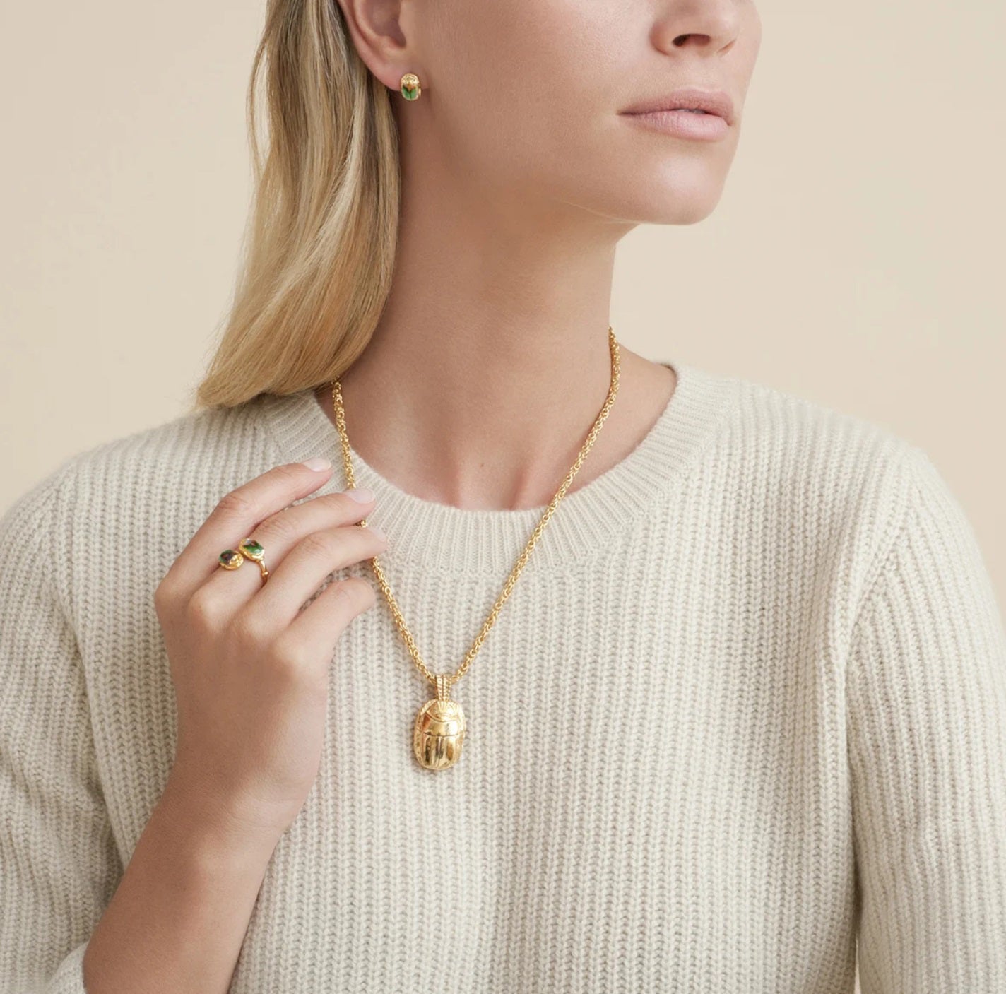 The GAS BIJOUX Scarabee Short Gold Necklace features a gold-plated design with a hand-engraved scarab beetle pendant, offering an elegant and adjustable fit.