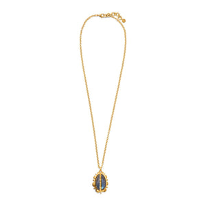 Introducing the CAPUCINE DE WULF - BLISS BLUE LABRADORITE NECKLACE by CAPUCINE DE WULF: a handcrafted gold necklace featuring an oval-shaped blue Labradorite gemstone set in a decorative 18K gold frame. The delicate chain has adjustable length links and is secured with a small clasp.