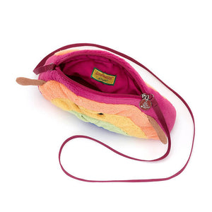 Product Description: The AMUSEABLE RAINBOW BAG by JELLY CAT is an open, vibrant crossbody bag featuring a rainbow pattern. It includes a sturdy magenta zipper, pink lining, and a strong webbed strap. Inside, a tag with the "Llamacorns" logo is attached. The bag also has two small brown ears near the top for added charm.