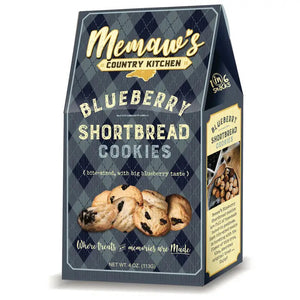 A blue and gray checkered box of Memaw’s Country Kitchen Blueberry Shortbread from 1 in 6 Snacks. The text highlights "bitesized with big blueberry taste." An image of the cookies is visible on the side, along with "Where treats & memories are made." These American homemade cookies have a net weight of 4 oz (113g).