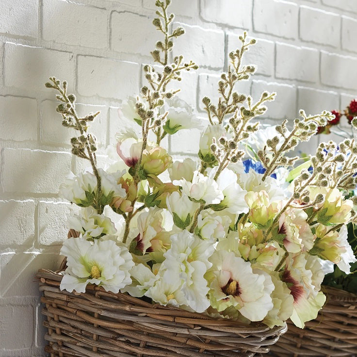 The HOLLYHOCK STEM 36 by NAPA HOME AND GARDEN is a single tall stem featuring realistic artificial white larkspur flowers with green leaves, perfect for home decor. The flowers showcase multiple clusters of small, delicate white blooms arranged vertically along the stalk.