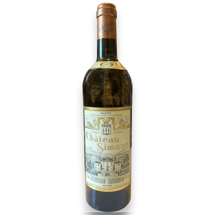 A bottle of CHATEAU SIMONE PALETTE BLANC 2021 by WINE: HAW RIVER WINE MAN features a detailed illustrated label with a chateau, vineyards, gold accents, brown foil capsule, and vintage year near the neck, evoking its historic Provencal estate origins.