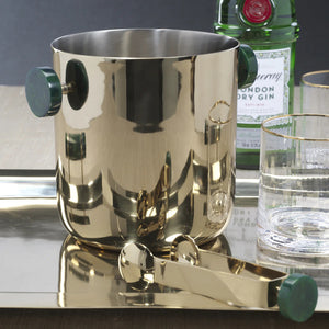 The SPIGA ICE BUCKET - GREEN ACCENTS by ZODAX features a shiny metallic, cylindrical design with two dark green handles, crafted from alloy resin for stylish home decor and shown against a white background.