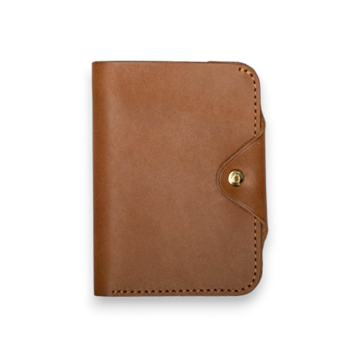 The WP STANDARD - PASSPORT WALLET by WP STANDARD is shown open on a white background with a U.S. passport on the right and an empty left pocket—a stylish full-grain leather travel essential.