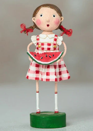 The ESC AND COMPANY - SWEET CAROLINA FIGURINE by ESC AND COMPANY, INC is a charming 6" poly resin figure. It features a girl with brown pigtails in a red-and-white checkered dress, standing on a green base, with her back turned and white socks accented by red stripes.