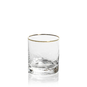 A clear, cylindrical NEGRONI HAMMERED DOUBLE OLD FASHIONED GLASS by ZODAX with a slightly textured surface and a thin gold rim at the top, boasting a capacity of 347 ml. The glass is empty and positioned against a plain white background.