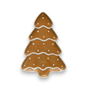 The GINGERBREAD TREE PLATTER by CREATIVE COOP, designed with a charming gingerbread tree motif, is perfect for holding marshmallows, small cookies, and red candies. Styled on a light surface, it brings a festive and cozy holiday atmosphere to your setting.