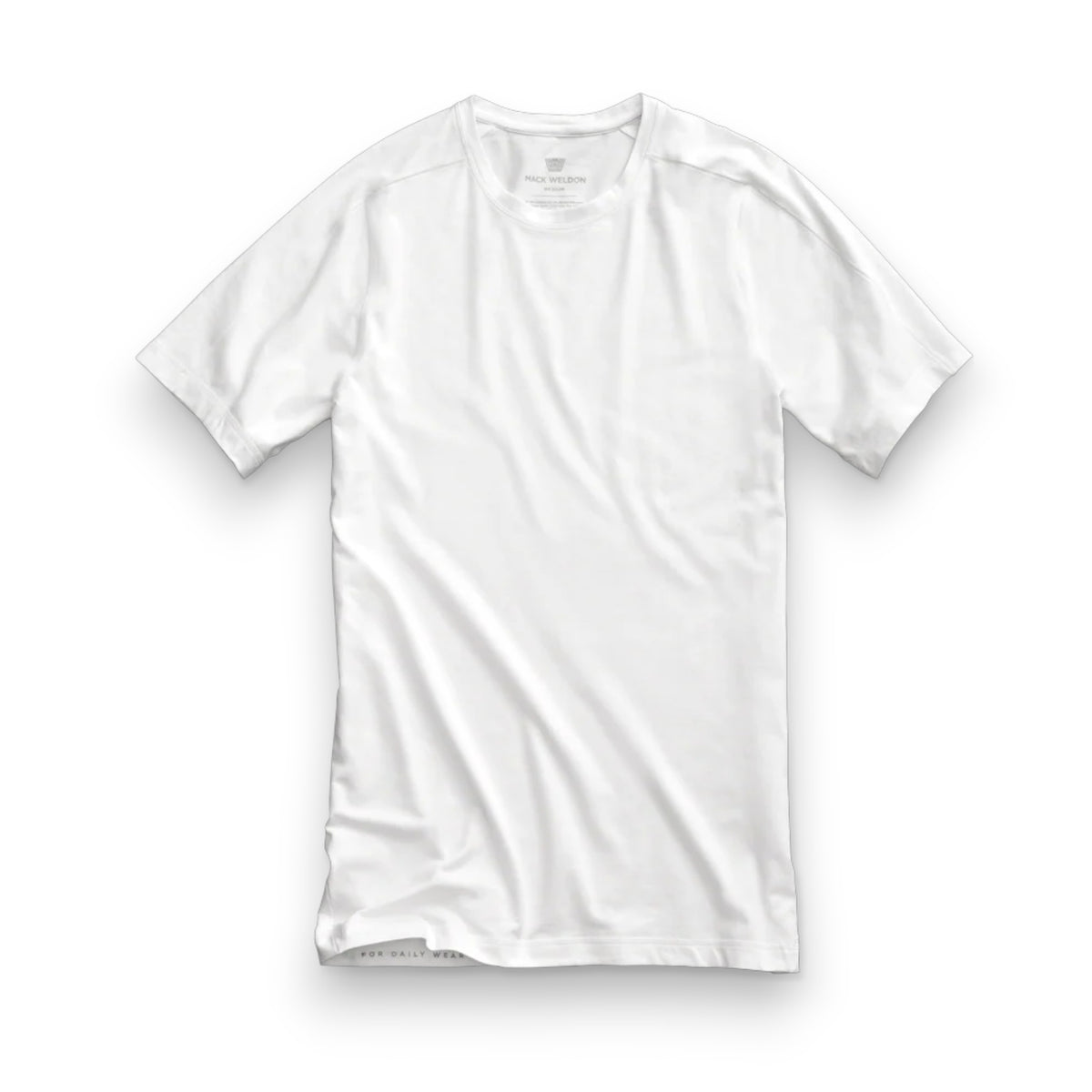 A man with short dark hair and a beard wears a slim fit white MACK WELDON - 18 HOUR JERSEY CREWNECK UNDERSHIRT and light blue pants, standing in profile against a plain light gray background.