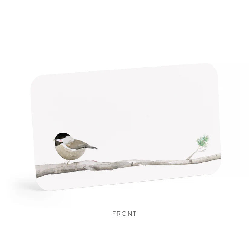 This Little Notes® notecard titled "Chikadee Little Notes" from E. Frances Paper features an elegant watercolor illustration of a small bird with a black cap and brown body perched on a branch. The design is set against a white background, accented by a small green leaf to the right, with the word "front" subtly displayed below.