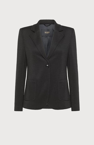 The SEVENTY - SINGLE BREASTED KNIT JACKET by the brand SEVENTY is a tailored women's jacket in black, featuring classic lapels, a single-button closure, and two front pockets. It has a sleek, fitted design and a minimalist, professional appearance. The interior is lined with the "SEVENTY" label visible inside.