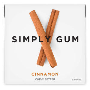 Image of SIMPLY GUM - CINNAMON NATURAL CHEWING GUM package with two cinnamon sticks crossed on a white background. Text reads "SIMPLY GUM," "CINNAMON," and "CHEW BETTER." Includes 15 pieces to enhance your chewing experience.