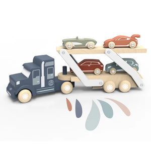 The SPEEDY MONKEY - CAR TRANSPORTER, by the brand SPEEDY MONKEY, is a charming wooden truck with a detachable trailer that elegantly carries four vibrant cars in blue, green, red, and orange. Primarily showcasing colors of blue and beige, this simple design inspires imaginative play for young minds.