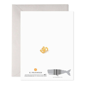 The OLD FASHIONED BIRTHDAY CARD by E.FRANCES PAPER features a beautifully crafted watercolor design of an Old Fashioned cocktail, complete with an orange slice and cherry garnish. The card includes the message, "Have a good old fashioned birthday," and is accompanied by a gray envelope, all printed on luxurious paper.