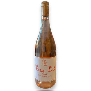 A bottle of LIEU DIT 'ROSÉ OF CABERNET FRANC' 2023 by WINE: KELLOGG SELECTIONS features a cork top, a "Lieu Dit Rosé" label with red script and "LD" monogram, and holds light pink wine crafted from Cabernet Franc in Santa Barbara.
