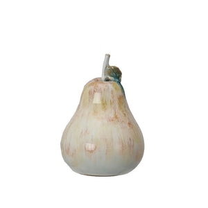 A STONEWEARE PEAR from CREATIVE COOP, featuring a textured finish in shades of cream and light brown. This pear has a short stem and subtle detailing that enhances its realistic appearance. Crafted with reactive glaze, its design beautifully complements any plain white background.