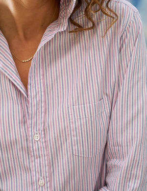 The FRANK AND EILEEN - EILEEN RELAXED BUTTON UP SHIRT is a relaxed fit, long-sleeve, button-down shirt featuring a pattern of thin, vertical red and white stripes. Crafted from 100% cotton, it sports a classic collar, single chest pocket, and partially rolled-up sleeves. The label reads "Frank & Eileen EST. 1947." It's the easiest-to-pull-off shirt.