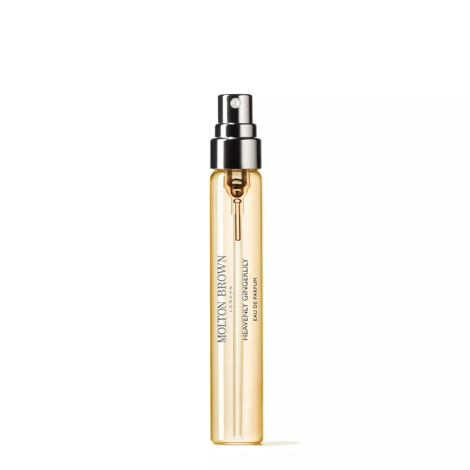 A slim, cylindrical bottle of MOLTON BROWN Gingerlily Eau de Toilette in an amber hue is shown against a plain white background. The bottle features a silver spray nozzle and cap, with the brand name and fragrance details elegantly printed on the front, hinting at its floral notes.