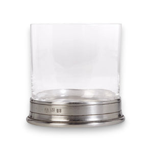 The MATCH - DOUBLE OLD FASHIONED GLASS by MATCH features a clear, wide, short tumbler with an Italian pewter silver base engraved with hallmarks, shown against a white background.