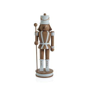 The ZODAX DECORATIVE NUTCRACKER WITH POLE is a wooden figure viewed from the back, adorned with a decorative hat and holding a pole. It features precise dimensions with brown and white detailing on its uniform, enhanced by decorative accents on the arms, hat, and boots.