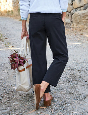 A pair of dark gray, wide-leg chinos from FRANK & EILEEN's Westport collection, made with performance twill. They feature belt loops and a front button closure, designed for a mid-rise fit. Inside the waistband is a "FRANK & EILEEN" label.