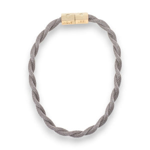 A finely braided twisted rope-style gold necklace with a textured finish, featuring a sturdy rectangular clasp in shiny gold plating. The necklace, known as the HOLST & LEE Twisted Mesh Necklace, boasts a sophisticated and elegant appearance and is displayed against a plain white background.