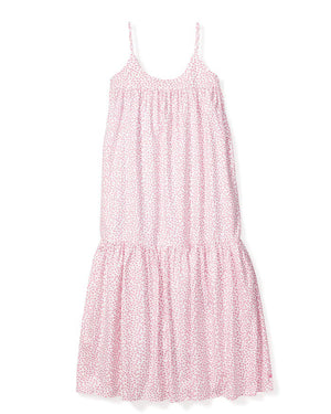 Introducing the PETITE PLUME - SWEETHEARTS CHLOE NIGHTGOWN, a luxurious sleeveless, ankle-length dress with thin straps and a soft, flowing silhouette. Crafted from the finest quality cotton, it boasts a delicate pink floral print on a white background and is gathered at the waist to create a tiered effect on the skirt—evoking an air of exquisite elegance reminiscent of luxury sleepwear.