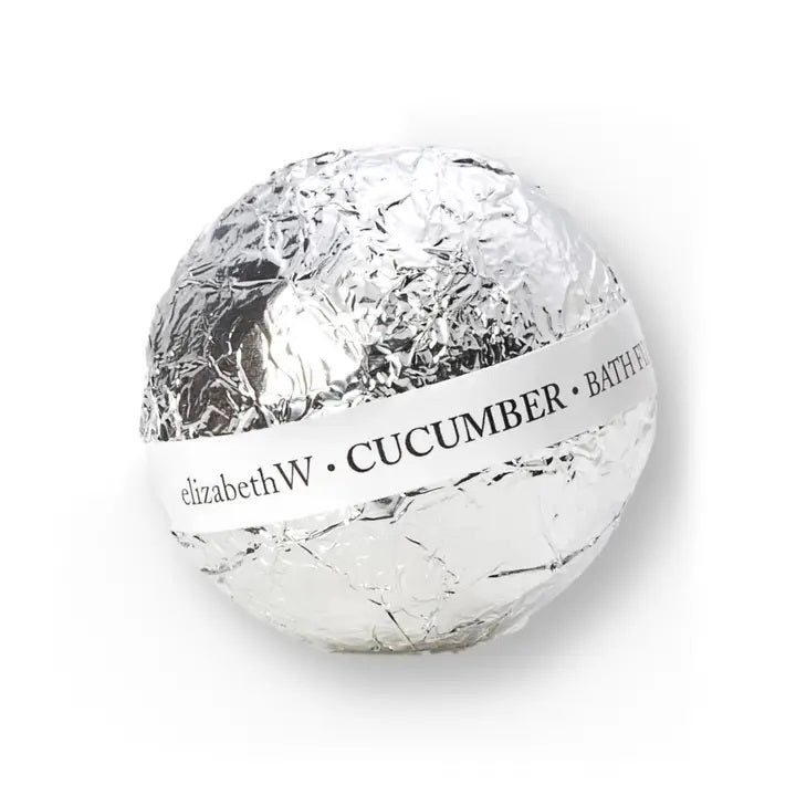 A silver foil-wrapped bath fizzy ball with a white band labeled &quot;E WIGHTMAN &amp; CO • CUCUMBER • BATH FIZZ BALL&quot; around its middle, offering sumptuous scents of cucumber.