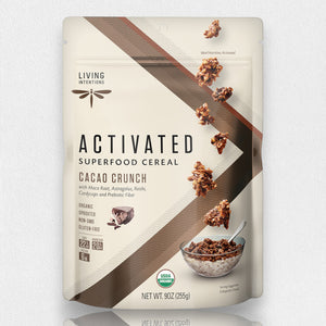 A beige and brown package of LIVING INTENTIONS - CACAO CRUNCH SUPERFOOD CEREAL, featuring the Cacao Crunch flavor. The bag highlights that it is organic, sprouted, non-GMO, gluten-free, and includes raw cacao. There is an image of cereal clusters and a bowl of cereal with milk. Net weight: 9 oz (255g).