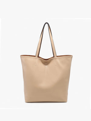 The TWO TONE REVERSIBLE TOTE by JEN & CO is displayed against a plain white background, featuring a red leather design with two handles. Its elegant two-tone appearance and subtly textured surface enhance the versatility and style it brings to any outfit.