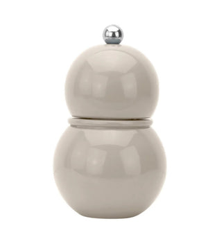 The Cappuccino Beige ceramic Addison Ross London Chubbie Salt or Pepper Mill (12cm) features a rounded design and a petite silver knob, resting elegantly on a white background, highlighting its subtle charm.