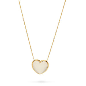 The CAPUCINE DE WULF - LOVE NECKLACE by CAPUCINE DE WULF is a delicate quartz heart necklace featuring a heart-shaped pendant with a smooth, translucent center. The pendant is elegantly suspended on a fine gold chain, creating a simple yet elegant design. This piece of handmade jewelry gleams beautifully against the plain white background.