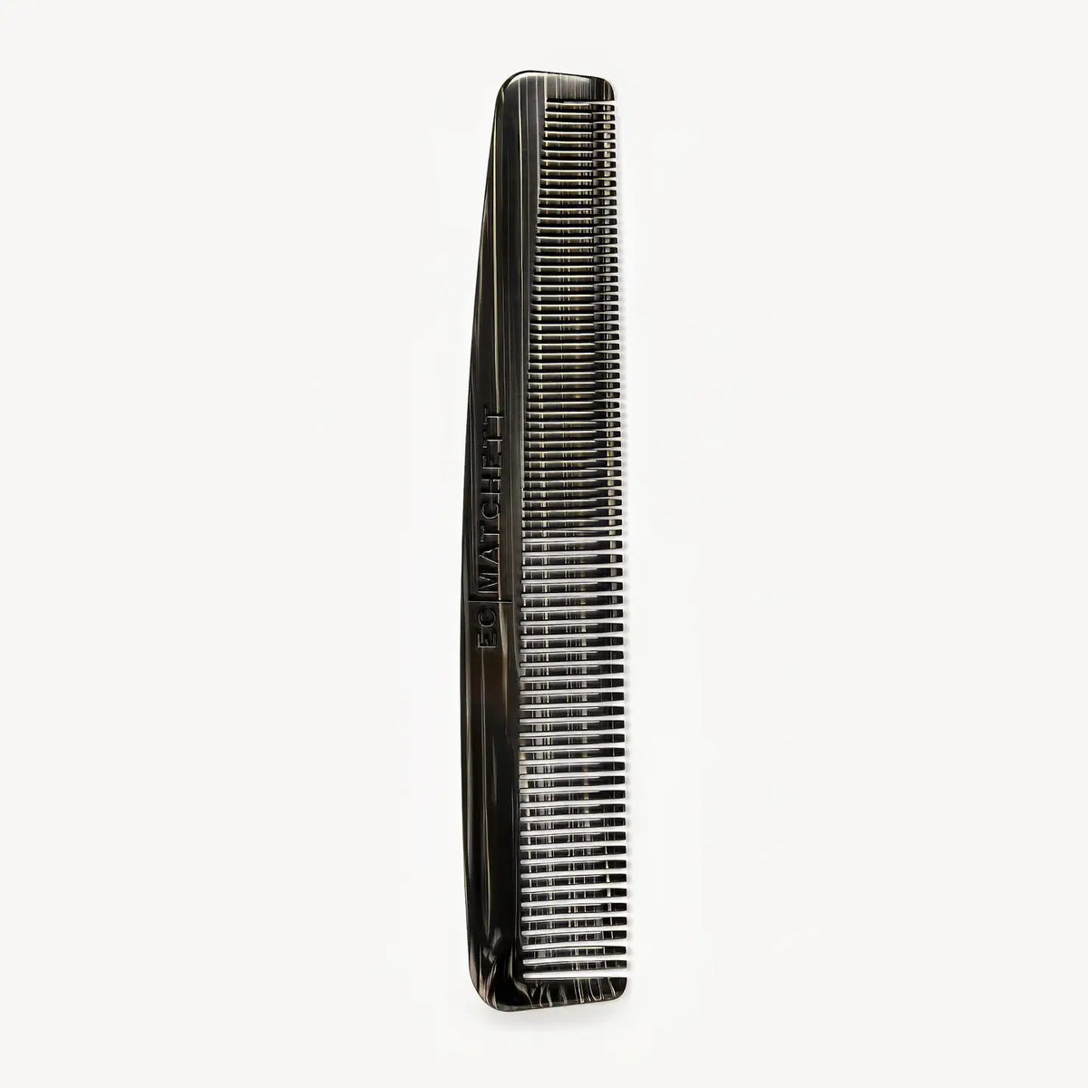 The MACHETE - BARBER COMB IN BLACK PEARL by MACHETE, made from black Italian acetate with fine, closely spaced teeth, is shown vertically against a plain white background.