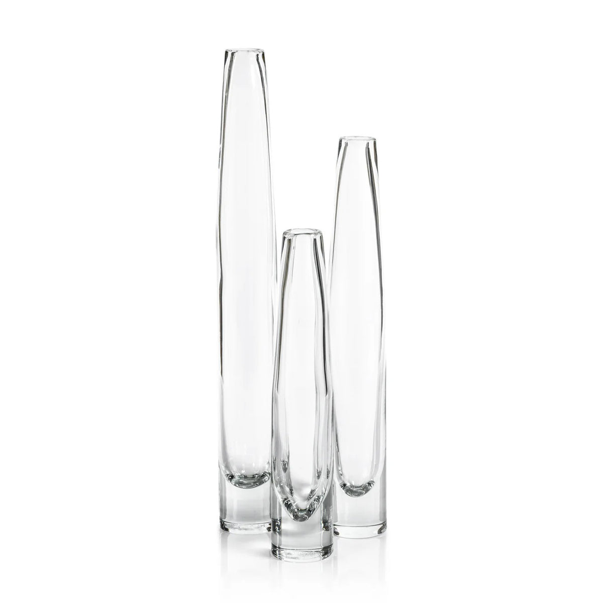The ZODAX TATE SLIM CLEAR GLASS VASE - SHORT, featuring a narrow neck and wider base, measures 2.5 in x 13.5 in and is shown against a plain white background.