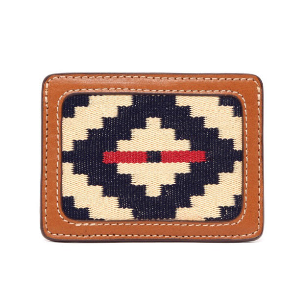 The LA MATERA - TRUCHA Woven and Leather Card Wallet by LA MATERA features brown Argentine leather trim and a woven center with a minimalist geometric navy, cream, and red stripe pattern.