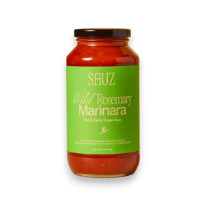 A 16-ounce (473g) jar of SAUZ - WILD ROSEMARY MARINARA tomato sauce. The green label with beige text describes it as "Fresh & Earthy Tomato Sauce" and "Not-Your-Grandma's Pasta Sauce." Ideal for a homemade dinner, the clear glass jar elegantly displays the sauce.