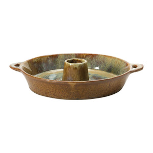 The DISH WITH TOOTHPICK HOLDER by CREATIVE COOP is a round ceramic bundt pan with a wide opening in the center, featuring a reactive glaze in shades of brown, green, and blue. The stoneware dish also includes two handles on opposite sides for easy gripping.