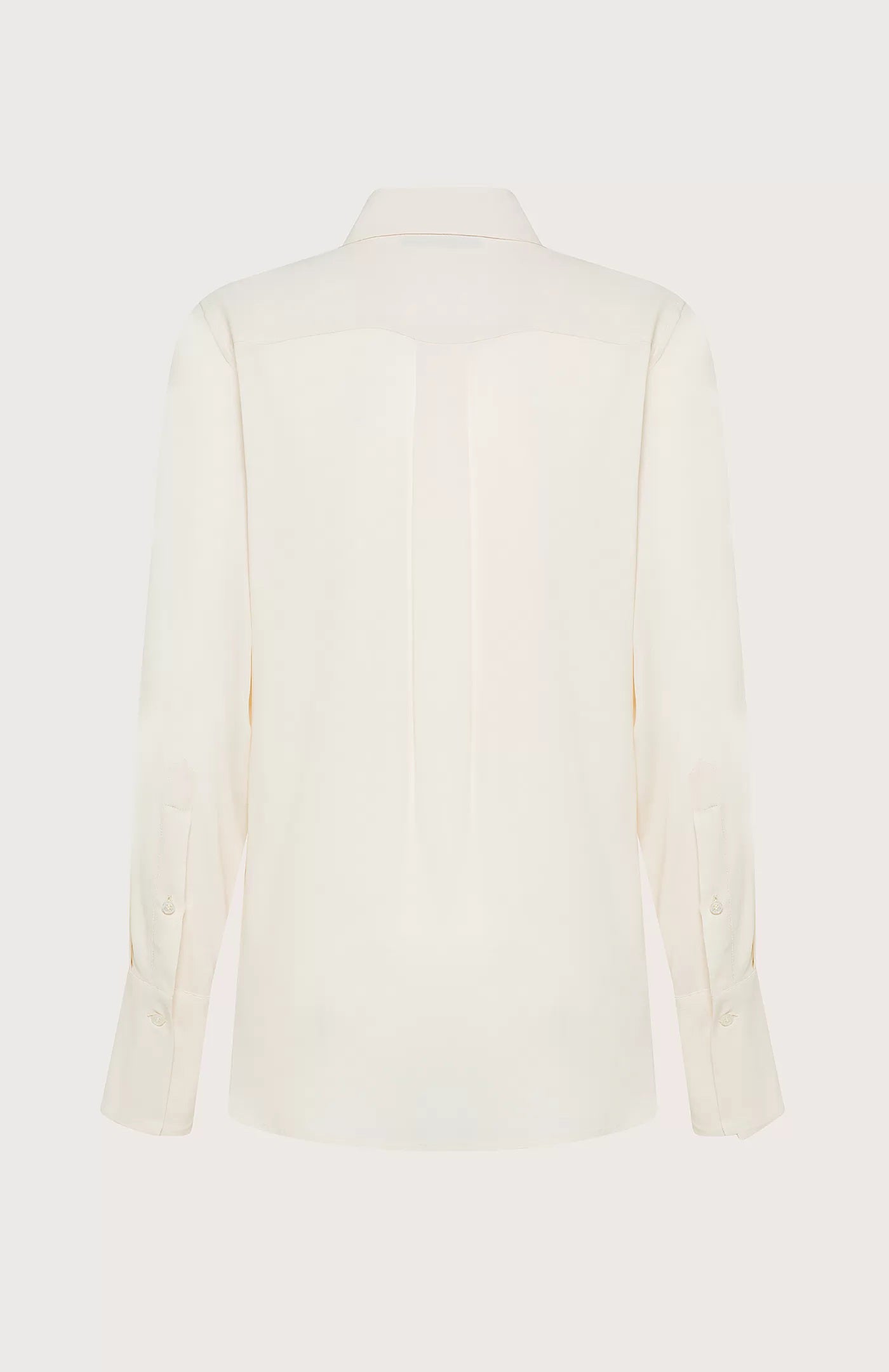 A SEVENTY - SILK BLEND BLOUSE in white is displayed against a light grey background. This long-sleeved, button-up shirt, made in Italy by the brand SEVENTY, features a classic pointed collar and buttoned cuffs. It boasts a smooth, minimalist design with no visible logos or pockets and is crafted from luxurious silk-blend crepe de chine.