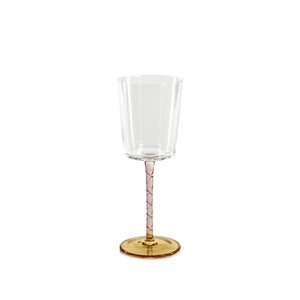 The VICENZA GLASSWARE WHITE WINE GLASS by ZODAX features a transparent bowl with a 350 ml capacity and stands 8.5 inches tall. The elegant wine glass has a clear bowl that contrasts beautifully with its gold base and pink marbled stem, all set against a white background.