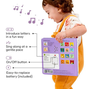 A child's hand presses a musical note button on the cover of a colorful ABC Sound Book titled "CALI'S BOOKS - SING THE ALPHABET NURSERY RHYMES." Featuring cute animal characters and alphabet letters, this award-winning toddler learning toy proudly displays badges for Brain Child and National Parenting Awards at the bottom.