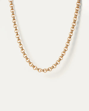 The JENNYBIRD RODIN NECKLACE is a high-polish gold rolo chain with interlocking round links arranged in an elegant circular pattern, beautifully showcased on a light background.