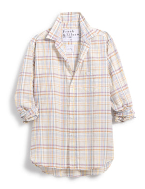 Introducing the FRANK AND EILEEN - EILEEN RELAXED BUTTON UP SHIRT IN SAND AND PURPLE PLAID, a lightweight, long-sleeved button-up shirt featuring a relaxed fit and bust-flattering button placement. The pastel plaid pattern comes in shades of sand and purple, perfect for a casual yet stylish look. Sleeves are casually rolled to the elbows and the label proudly reads "Frank & Eileen EST 1947.