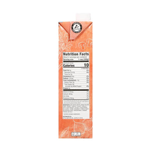 A red and black carton of KETTLE & FIRE - GRASS FED LOW SODIUM BEEF COOKING BROTH 32OZ. The front displays labels such as "100% Grass-Fed," "No Preservatives," "Low Sodium," and "Beef Broth." With a 32 oz (907g) capacity, icons indicate it is a slow-simmered, high-quality cooking broth perfect for enhancing recipes.